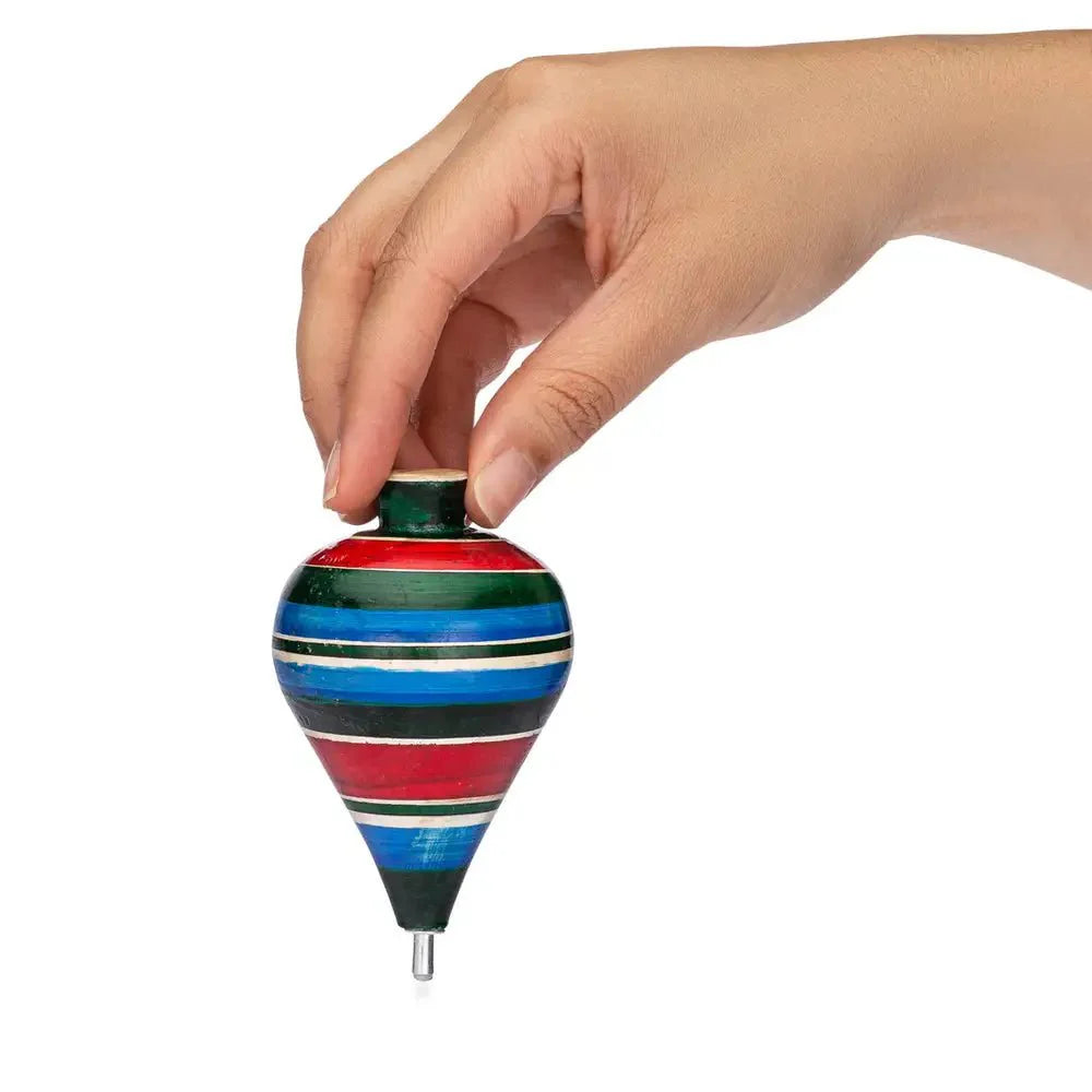 Handcrafted traditional Mexican toys, including colorful wooden spinning tops, marionettes, and balero toys, made by skilled artisans for children and collectors.